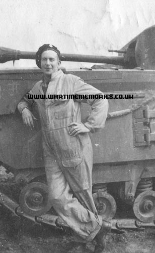 Dad in front of a Churchill tank